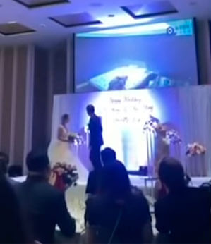 Durante o próprio casamento, noivo exibe em telão vídeo em que a noiva transa com cunhado